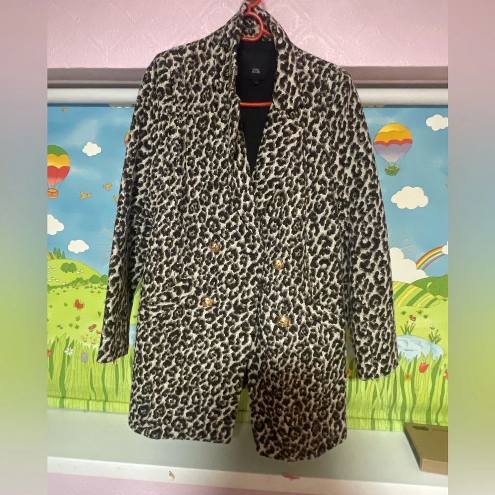Leopard Print coat from River Island..Size Uk 12.Fairly new and good condition. - Picture 1 of 2